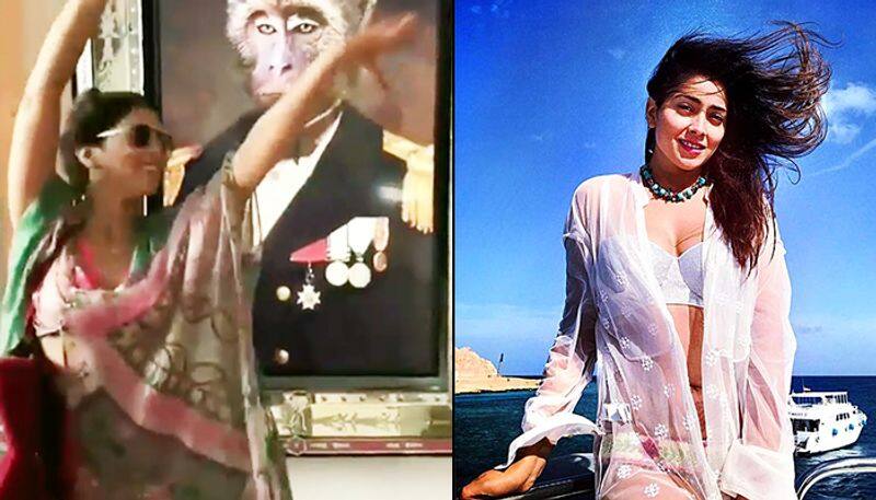 Shriya Saran breaks into crazy dance in pink monokini in London goes Viral