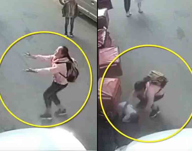 Brave primary school girl leaps forward to save falling baby