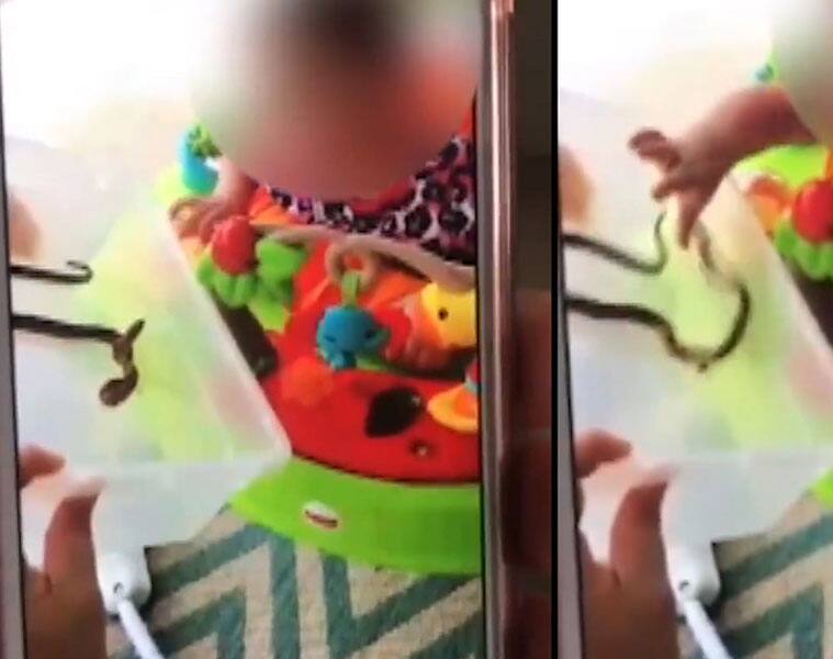 This woman uses a snake to teach the baby a lesson