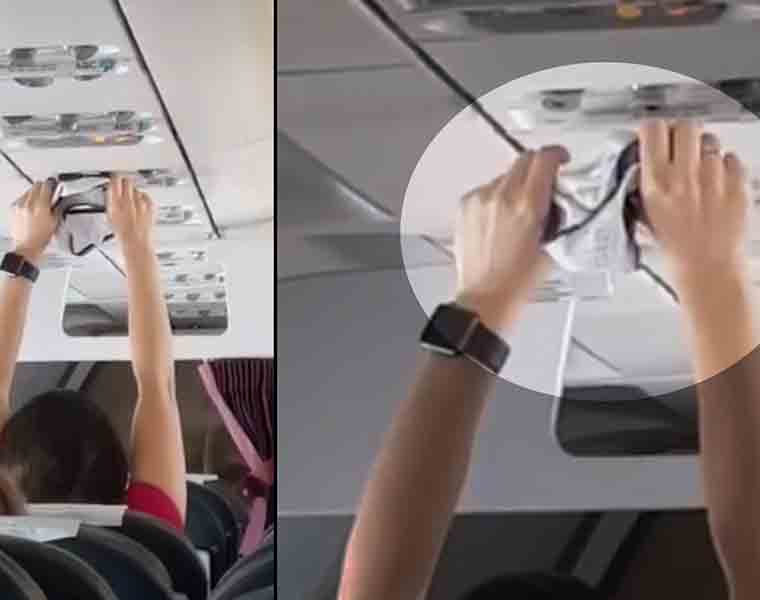 This woman passenger uses the aeroplane's AC vent to dry her wet underwear. Here's how