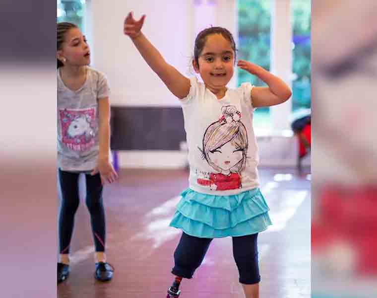 child dancing with a prosthetic leg will melt your heart