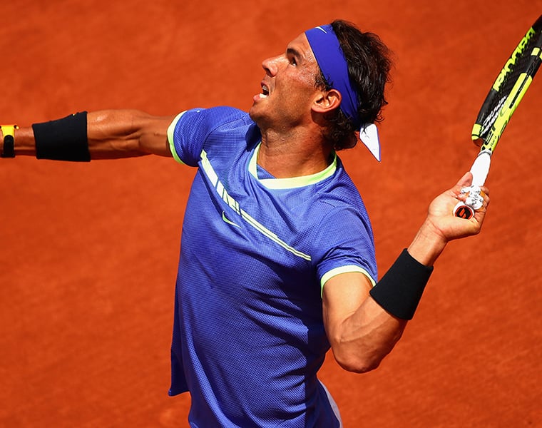 Nadal completes fightback to reach 11th French Open semi final