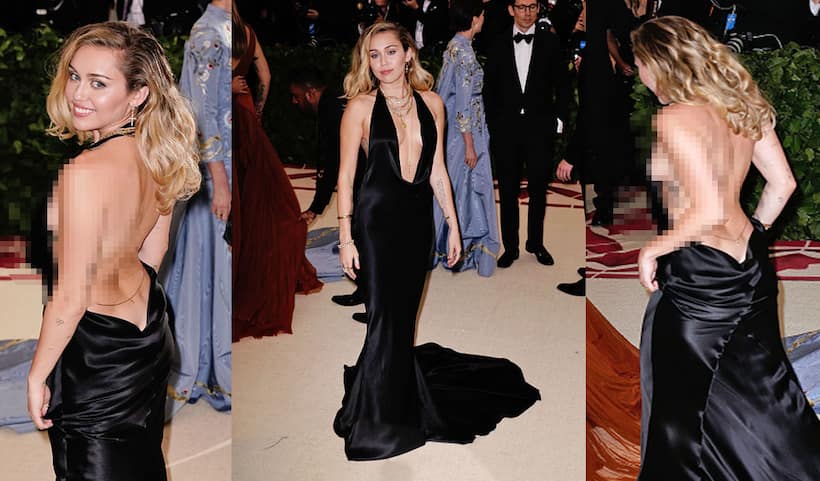 Miley Cyrus goes braless and has an 'oops' moment in a low cut backless gown. Take a look