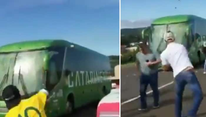 Brazil Fans Throwing Stones and eggs on Team Bus