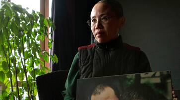 China frees Nobel widow from house arrest