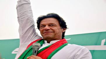 Pakistan elections: Cricket star Imran Khan leads in slow count of vote