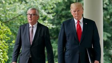 Trump, European Union's Juncker agree to pull back from trade war to ease tension