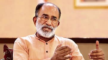 K Alphons Kerala floods Pinarayi Vijayan government profit dam opening