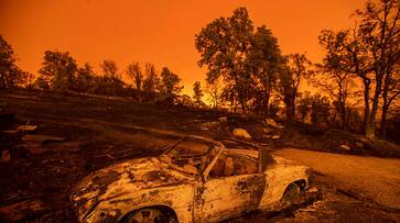 California wildfire destroys 500 structures, nearly levels community