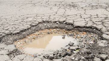 Father fills 556 potholes in Mumbai after losing 16-year-old son to municipal apathy