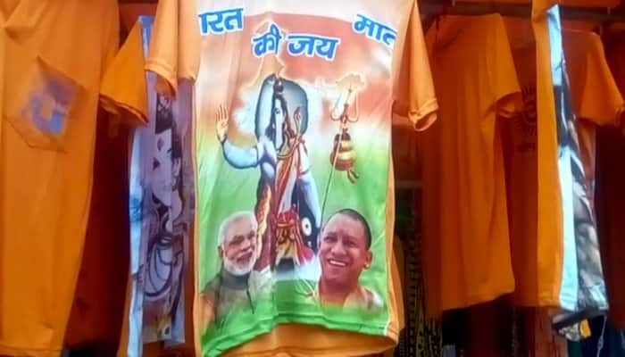 Markets decked up with t-shirts printed with mantras and also photographs of PM Modi & CM Yogi,