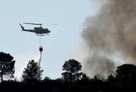 Portugal fire spain heat France firefighter aircraft temperatures rise