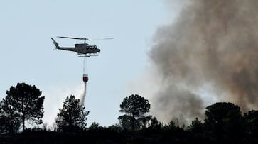 Portugal fire spain heat France firefighter aircraft temperatures rise