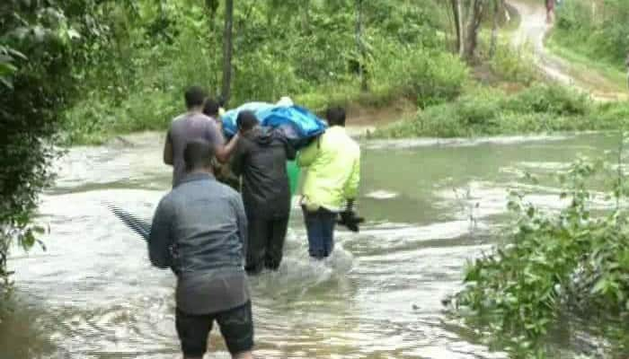 Family Struggles To Carry Dead Body After Bridge Collapses in Madikeri