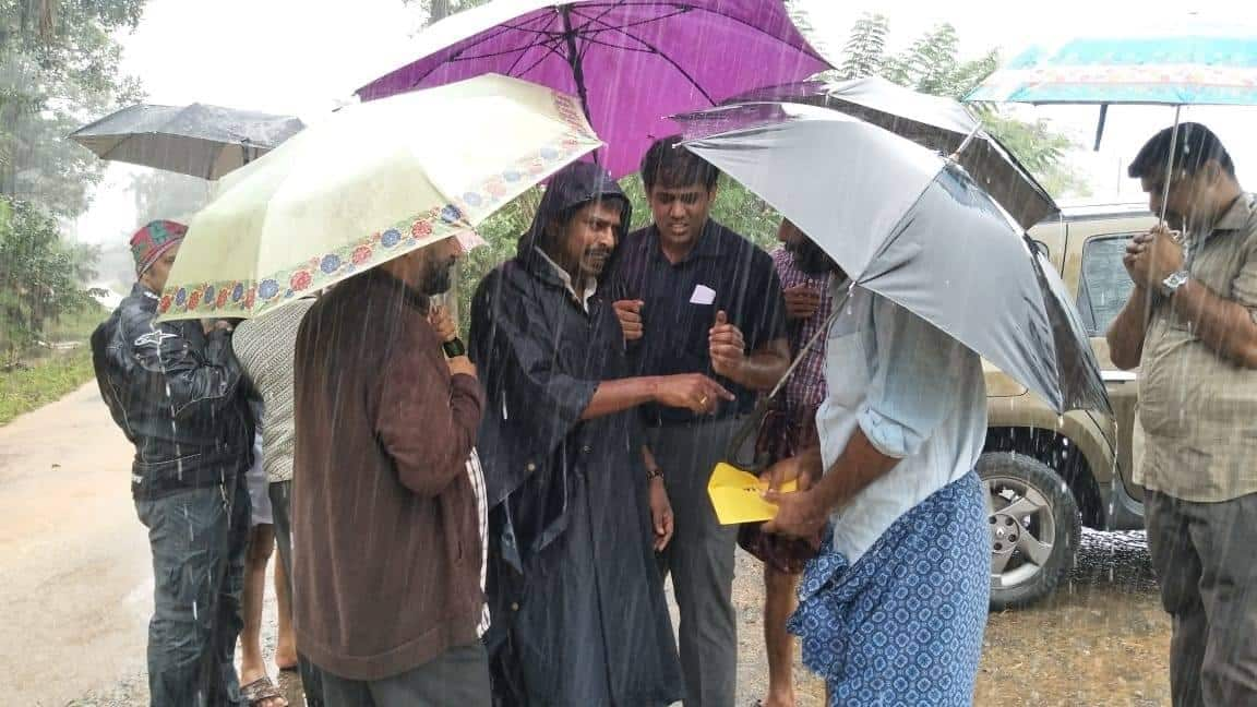 Kerala rescue team IAS officer raja manickam take rice bags