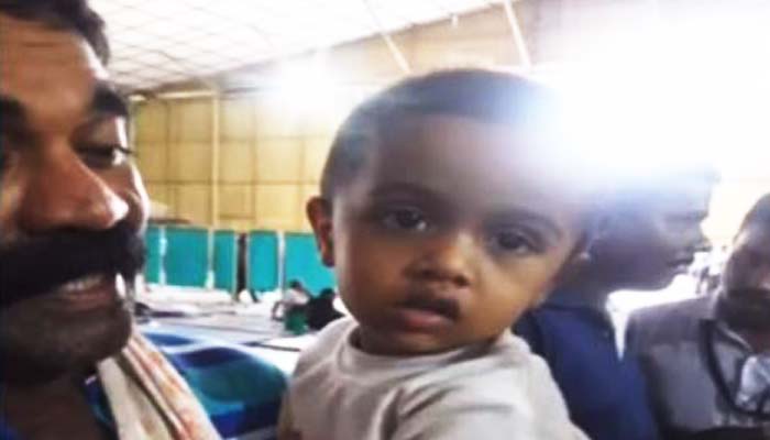 Navy seeks relatives of an isolated child in the flood