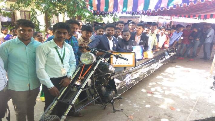 Students prepared 15 people motor bike and achieved two records