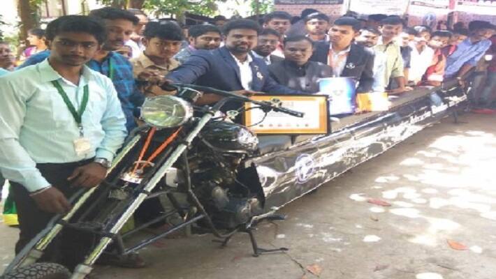 Students prepared 15 people motor bike and achieved two records