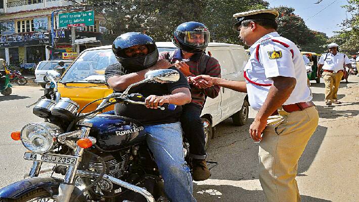 case on both who drive bike and who sitting back without helmet Police Warning