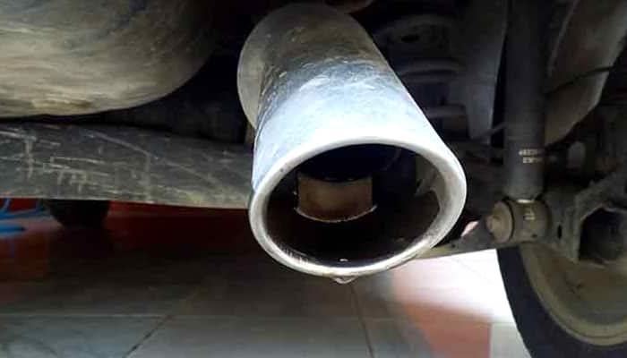 Why Water from car exhaust pipe