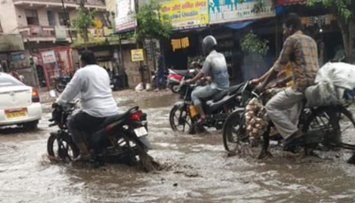 As Heavy Rain Pounds Delhi Roads Flooded Waterlogging Hits Traffic