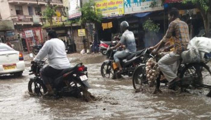 As Heavy Rain Pounds Delhi Roads Flooded Waterlogging Hits Traffic