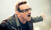 Bono loses voice mid-concert, U2 cancel Berlin show