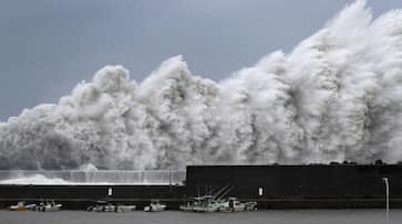 Japan Tokyo flood landslide typhoon jebi heat osaka hokkaido earthquake