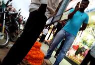 Karnataka Municipal member thrashes flower vendor refused  pay more money Video