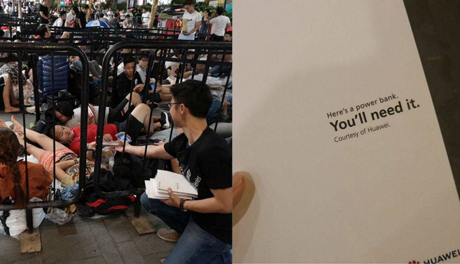 Huawei distributes free power banks to people queued outside Apple store