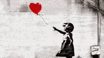 Banksy girl with a balloon Sotheby  graffiti artist art prank