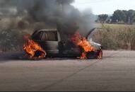 burning car on road madhya pradesh raisen