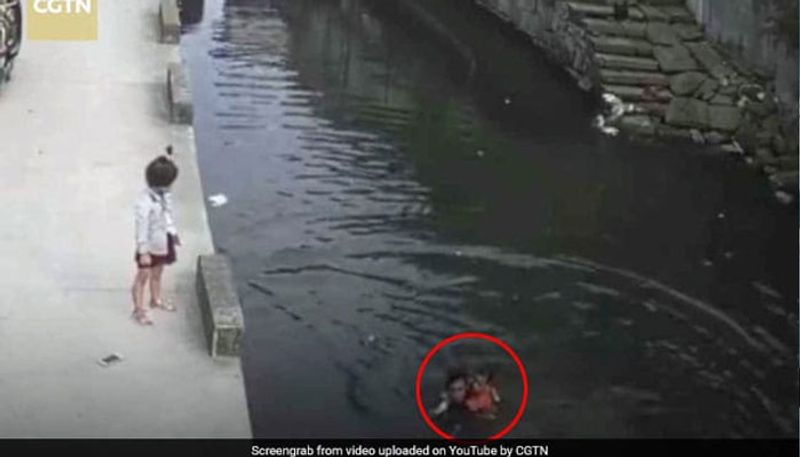 Caught On Camera Delivery Man Saves 6-Year-Old Girl From Drowning