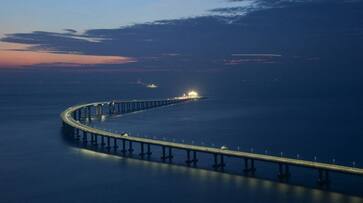 China Hong Kong world longest sea crossing bridge Xi Jinping political significance