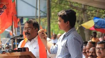 Kerala CPM leader's daughter Asha Lawrence removed from job  son participates BJP protest