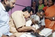 Karthyayani Amma tops exams Kerala minister C Raveendranath laptop