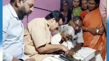 Karthyayani Amma tops exams Kerala minister C Raveendranath laptop