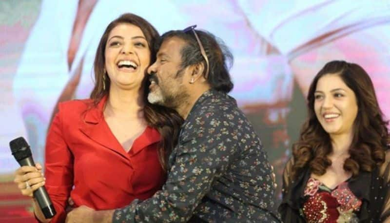 Chota K Naidu kisses Kajal Agarwal at an event