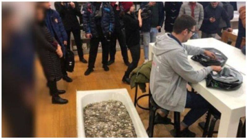 a man  collected coins to buy