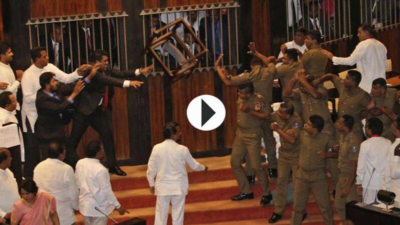 Sri Lankan Parliament...chairs and throwing chilli powder