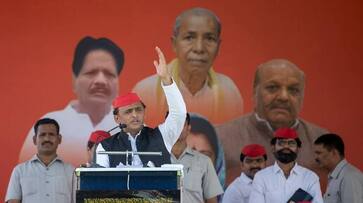 akhilesh slams congress