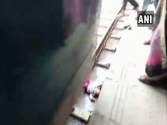 One-year-old girl escapes unhurt after a train runs over her