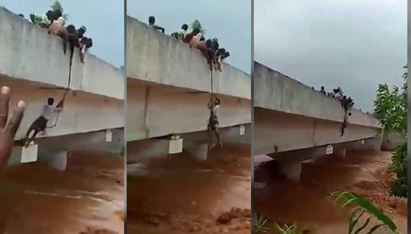 Man saved Cyclone Gaja rope viral video Dindigul Tamil Nadu