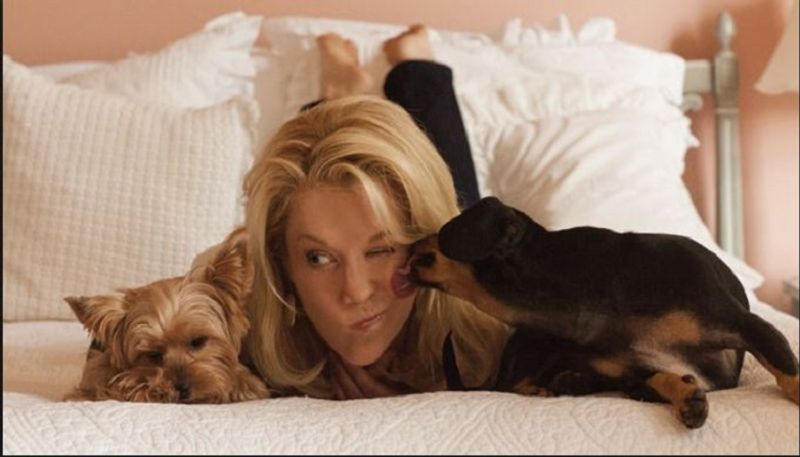 A New Study Says Women Sleep With Better With Dogs