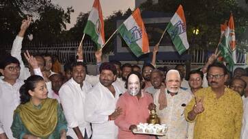 congress workers sell tea wearing prime-minister-narendra-modi-and-amit-shah mask, Smirit Irani furious