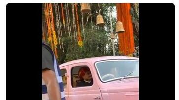 Anand Piramal special family members aka his dogs vintage pink baraat car will give you wedding goals