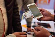 Aadhaar  voluntary for mobiles bank accounts Modi-headed Cabinet amendment