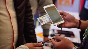 Aadhaar  voluntary for mobiles bank accounts Modi-headed Cabinet amendment