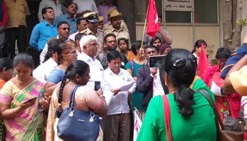 Migrant workers lay siege BBMP office over power cuts