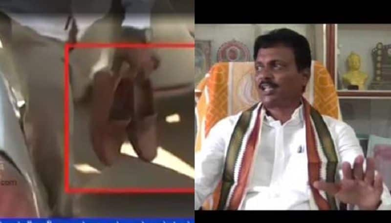 Activist Puts Shoe For Congress Minister E Tukaram In Bellary